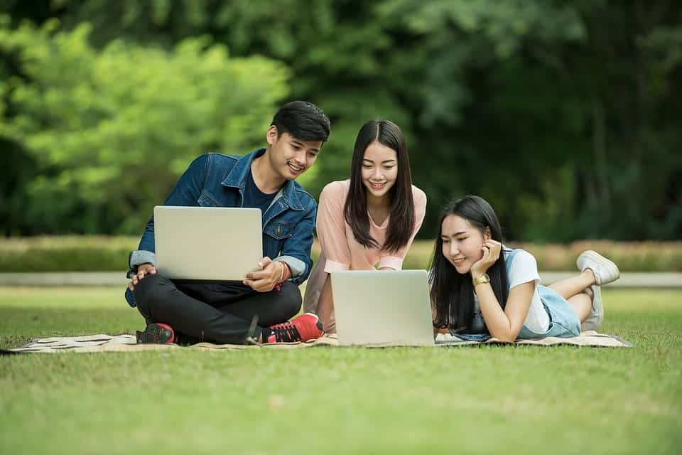 happy students watch video